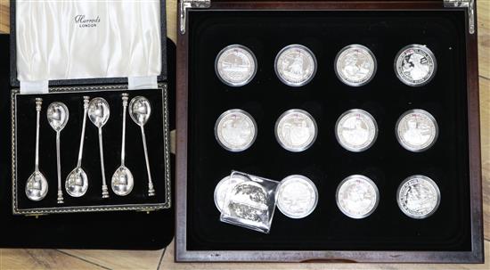 A cased set of 12 Jersey and Channel Islands history of royal navy silver crowns and cased set of 6 silver tea spoons